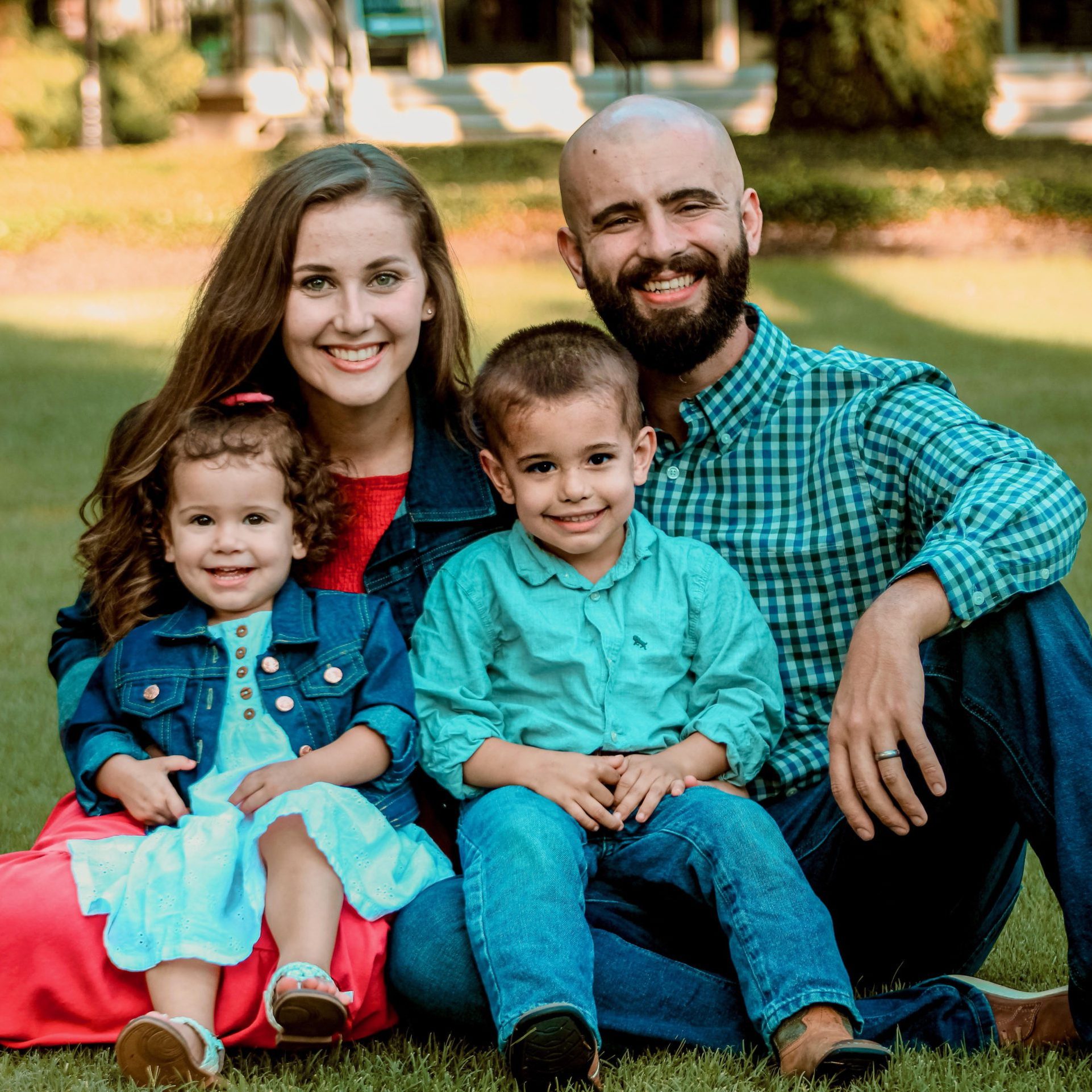 Youth Pastor Kyle Hillman with wife Audrey and children Owen and Natalie